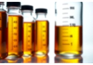 Precision Filled Glass Juice Bottles with Graduated Markings for Dosage