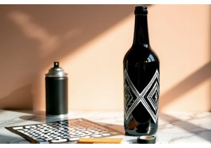 How to Decorate Glass Bottles with Stencils and Spray Paint