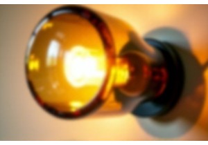 DIY Glass Bottle Sconces That Add Warmth to Any Wall