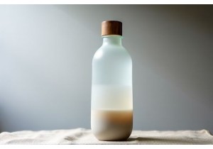 Handcrafted Glass Water Bottles Featuring Artisan Blowing and Frosted Details